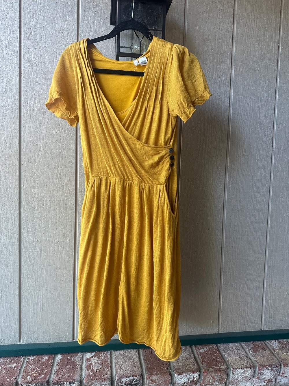 Autumn Gold wrap style dress. Short sleeve, knee length. Light sweater fabric.